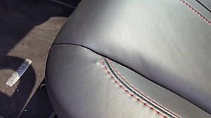 Something poking through leather seat-20170903_115817.jpg