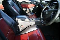 Interior color options on S-Types-2003-s-type-r-black-red-interior-driver.jpg