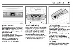 Amber light next to Homelink buttons-road.jpg