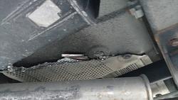2003 Jaguar XJ8 exhaust heat shield near mufflers.-hs_under_car.jpg