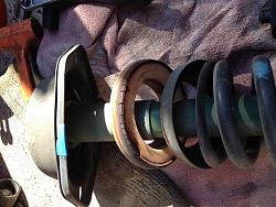 Suspect rear uppper shock mounts 2003 XJR-spring_upper_isolator.jpg