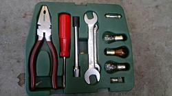 Compartment in engine bay-tool-kit-photo.jpg
