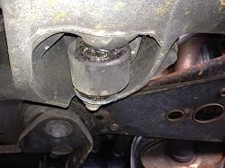 Sounds like something flopping around....-lower-bushing.jpg