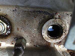 water on the top of hte engine-xj6-core-plug-weeping.jpg