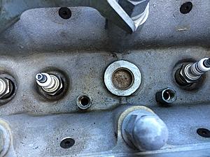 water on the top of hte engine-xj6-new-core-plug.jpg