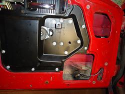 Are there any aftermarket speakers that won't need an amp?-jag-door-holes-speakers.jpg