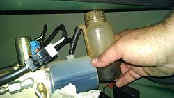Adding fluid to the convertible top pump reservoir-refilling-convertible-top-pump-reservoir.jpg